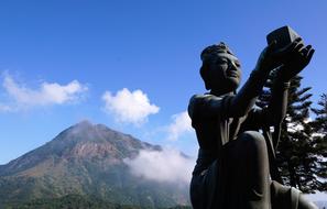 statue of a woman in the mountains of china