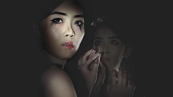 dualism of a woman in reflections