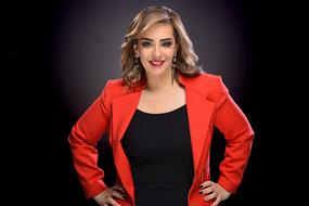 beautiful blonde posing in red jacket