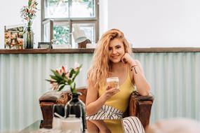 young blonde woman with coffee