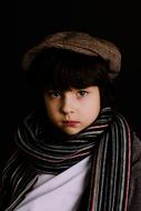portrait of a boy in a scarf