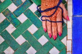 Mehndi, female hand with henna design