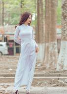 Girl in long stylish dress outdoor