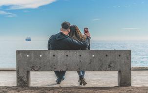 couple on the concrete bench