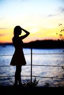 Woman sunset gold