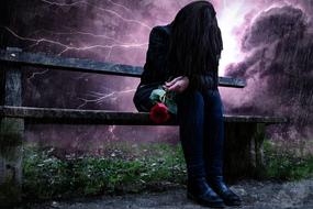 sad woman with a rose