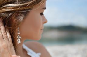 [portrait of a woman with pearl earrings