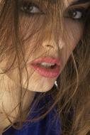 sensual young Woman with hair in front of face