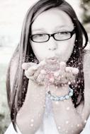 Girl Blowing Glitter