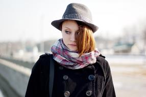 redhead girl with hat in autumn