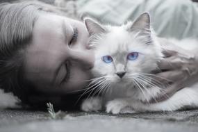 portrait of a woman with white cat