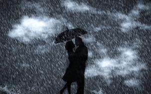 silhouettes of a man and a woman under an umbrella