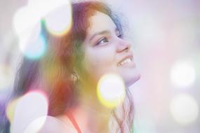 happy woman portrait with bokeh effect