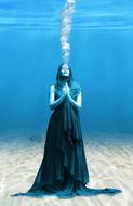 Beautiful woman, in the sea, on the sandy floor, with the bubbles, clipart