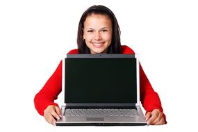 girl in a red sweater with a laptop