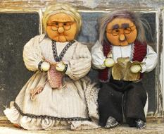photo of dolls in the form of grandparents