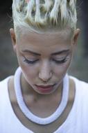 blonde with a fashionable hairstyle