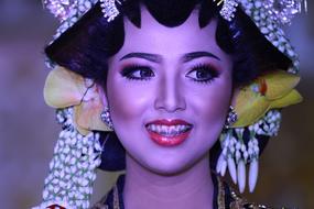 portrait of young girl with Traditional Javan Wedding headdress