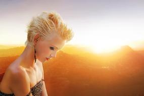 photo of blonde girl at sunset