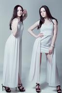 girls in white dresses posing on a white background