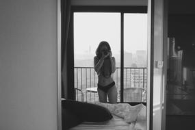 young woman making picture of herself