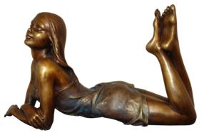 girl in a pose as a bronze sculpture