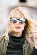 stylish young Girl in dark glasses, portrait