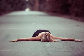 blonde on the road at a photo shoot