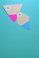 paper tags on the blue background
