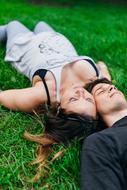 Couple Laying Grass green