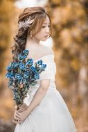 Forest Woman White dress blue flowers