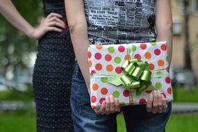 present in Young Girl hands