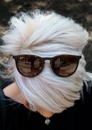 fashion sunglasses on the head of the blonde