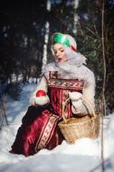 photo of girl in traditional dress at Winter