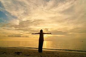 woman meeting sunset