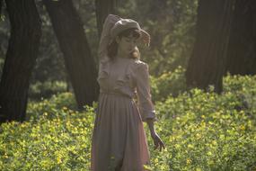 elegant girl in a beret in the park