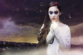 mysterious woman in a fantasy landscape