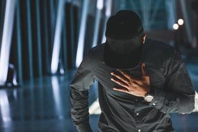 dark skin Guy in black cap