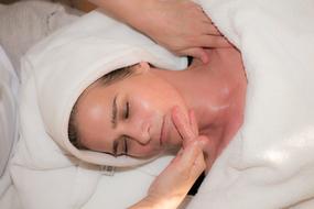 Women on the massage with cosmetics