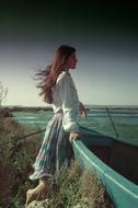dreamy young woman with long hair