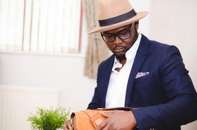 african Man in stylish Suit and hat