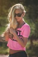 blonde in pink t-shirt