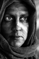 black and white, woman in headscarf, close-up