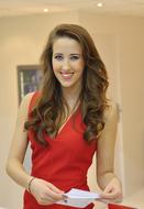 attractive smiling Young Girl in red dress