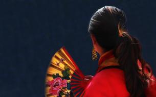 Woman with Red Fan