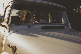 couple in Vintage Ford car