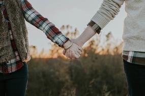 people Couple holding hands