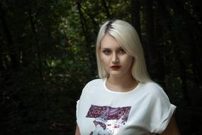 Girl Beauty Model in dark garden