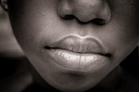 closeup view of Black Face lips