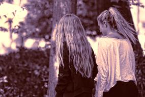 two girls in the park in monochrome